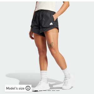 Adidas black athletic cargo shorts